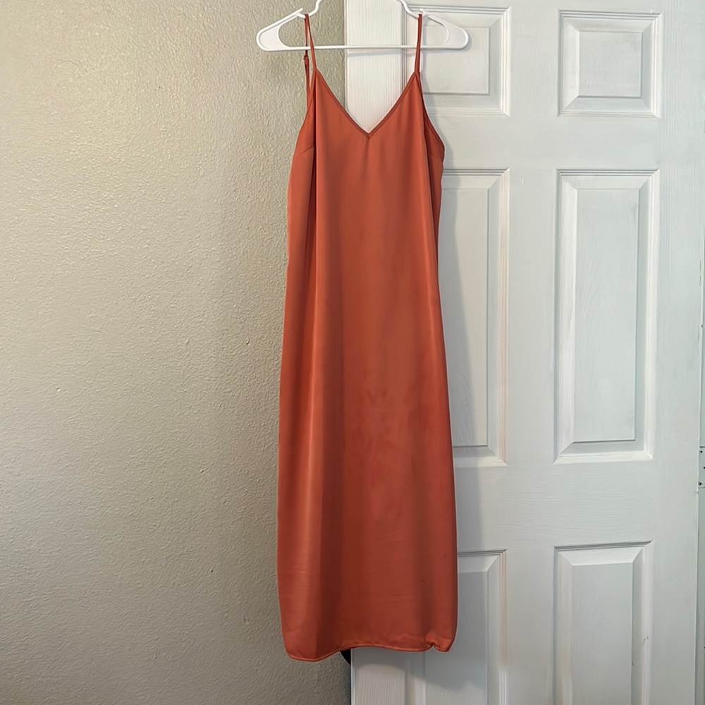 A pink silk dress from target! Only wore one time size Small!